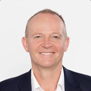Paul Wells, Managing Director and CEO